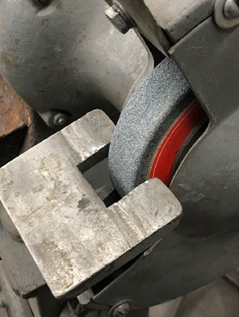 File:Bench grinder unsafe tool rest.png