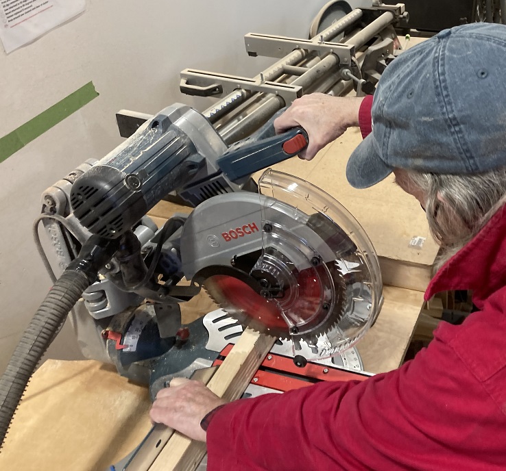 File:Miter saw in action.jpg